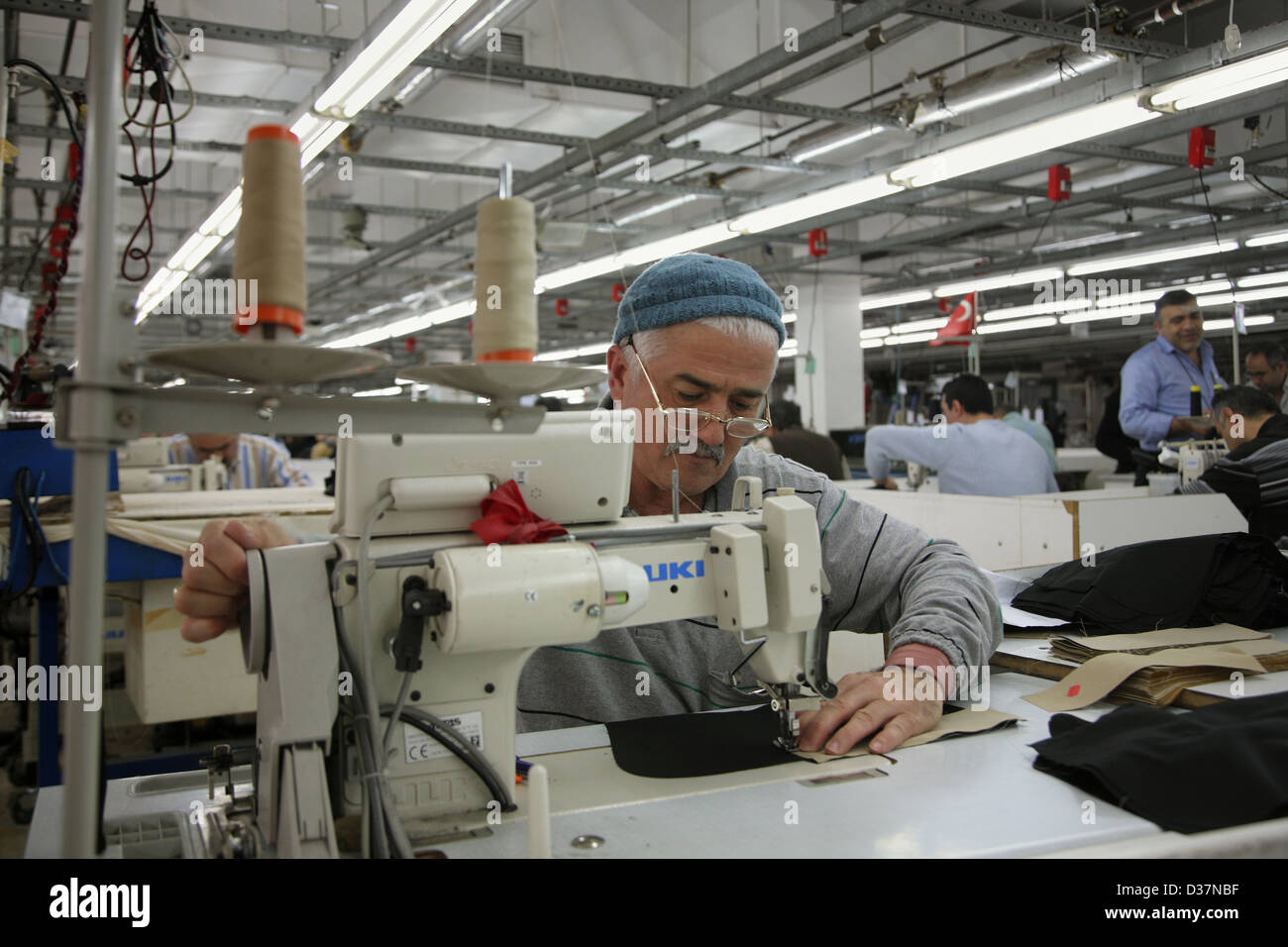 Istanbul, Turkey, an employee at a sewing machine in a textile mill