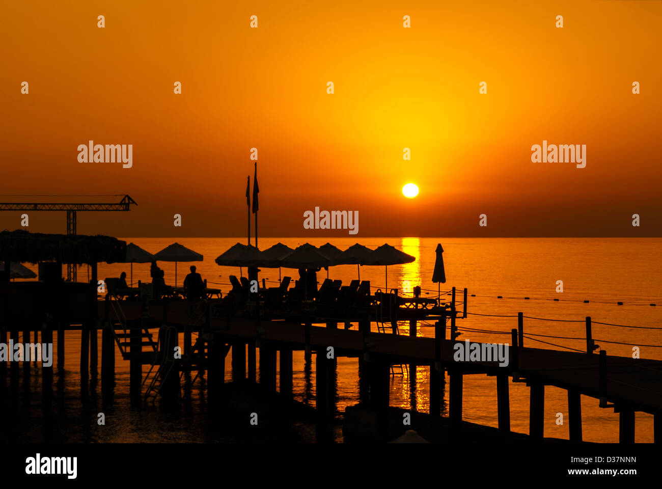 Pier Resort Silhouette at the Sunrise over sea Stock Photo - Alamy