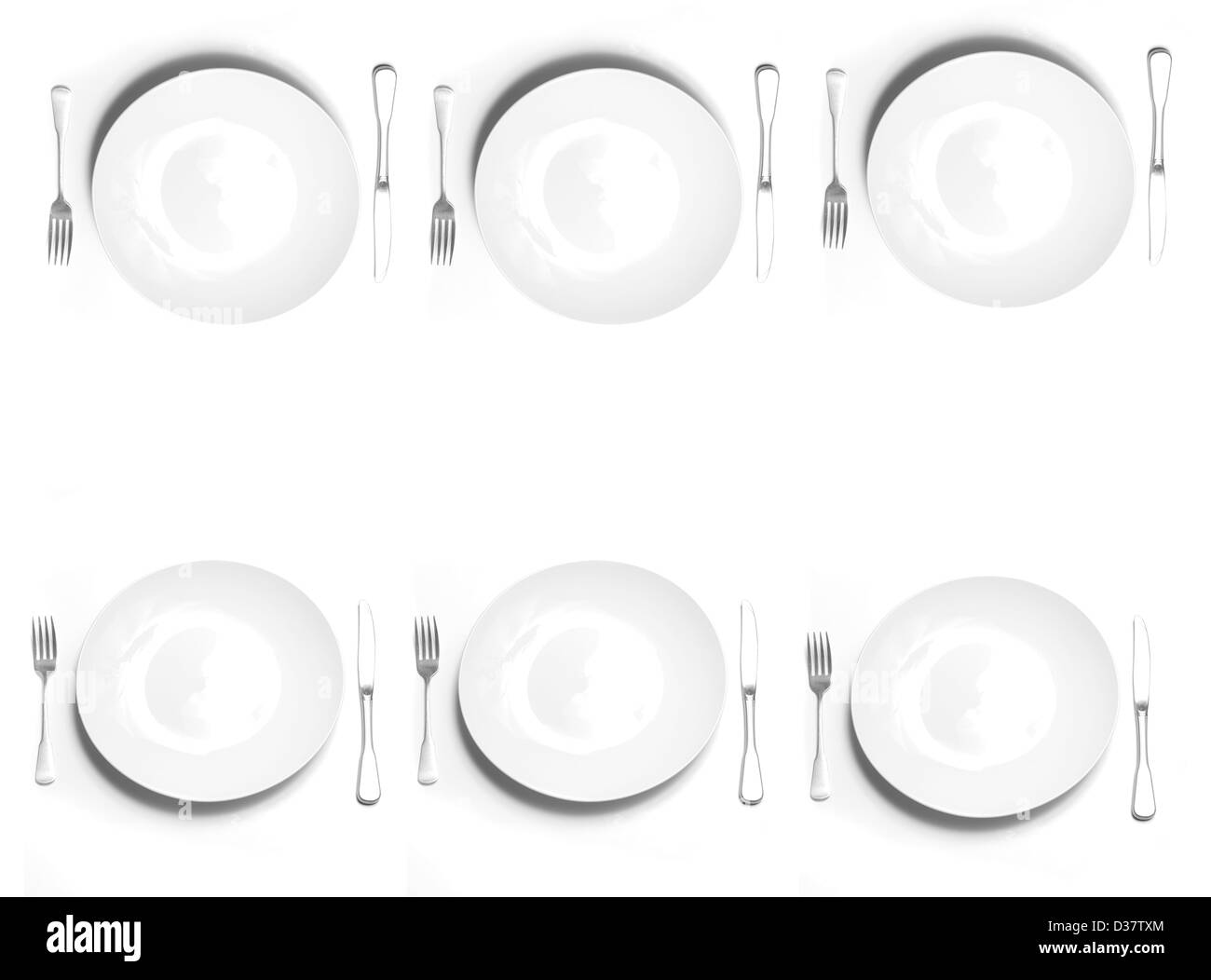 Knife and fork silverware with white plate on white background Stock