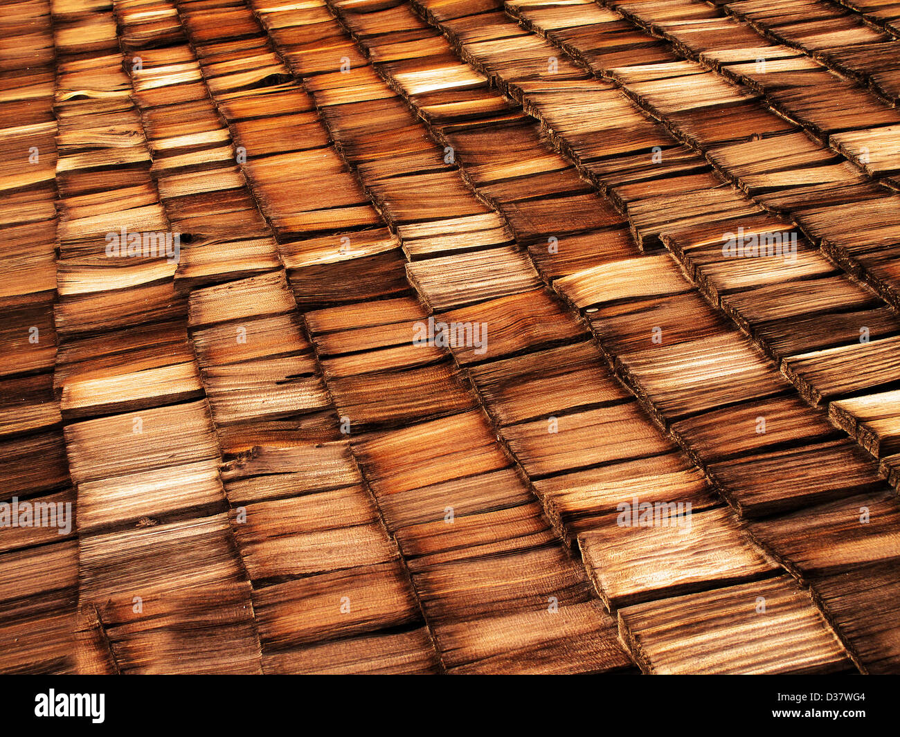 Old wood shingle roof with texture and brown color Stock Photo