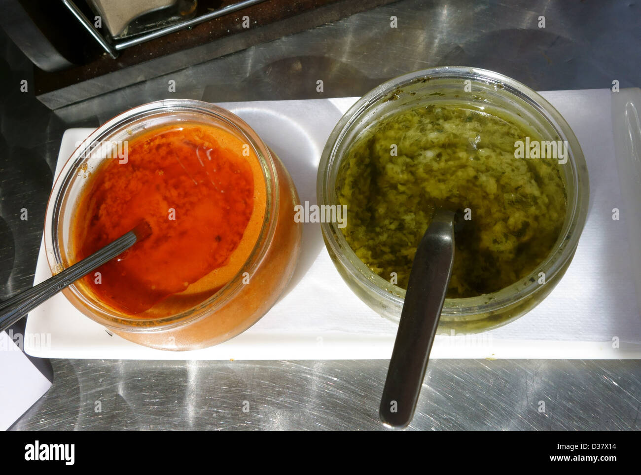 Typical red and green mojo dips to accompany food in Tenerife, Canary Islands, Spain Stock Photo
