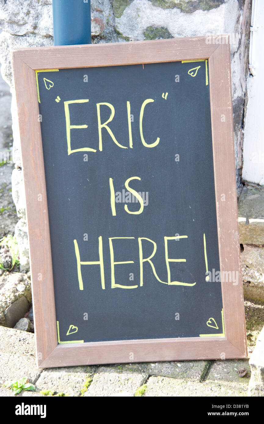 Eric Is Here Yellow Chalk Writing on Blackboard Stock Photo Alamy
