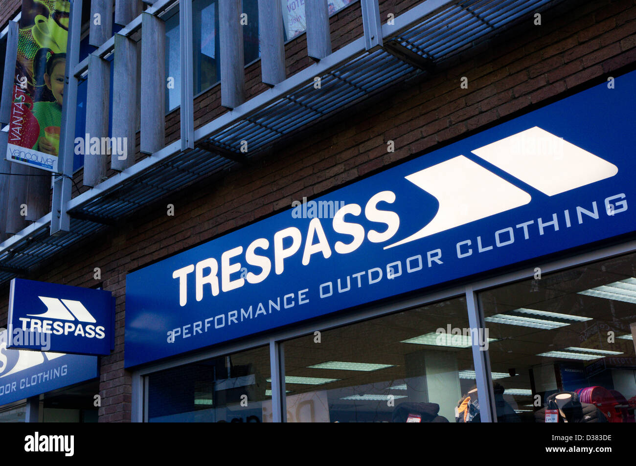 Sign on Trespass shop selling performance outdoor clothing. Stock Photo