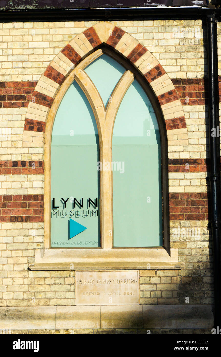 Sign for Lynn Museum on arched window of building. Stock Photo