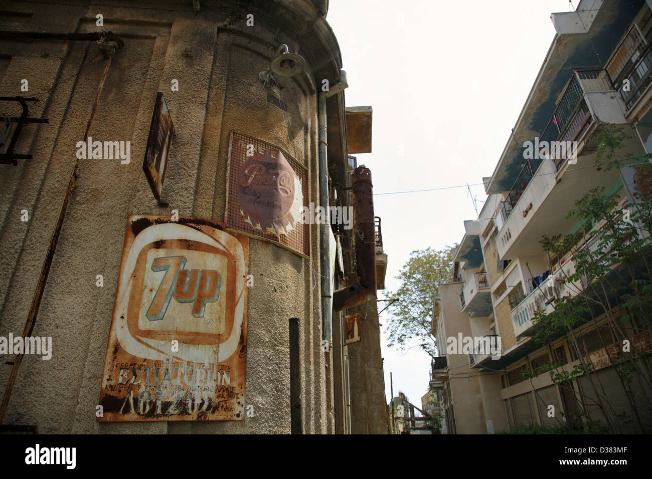 Rusty advertising signs on a house wall, Nicosia, Cyprus Stock Photo
