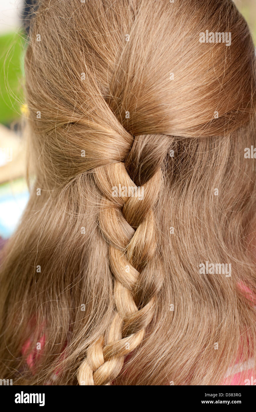 Young girl platted plaited pony tail hair style FULLY MODEL RELEASED Stock  Photo - Alamy