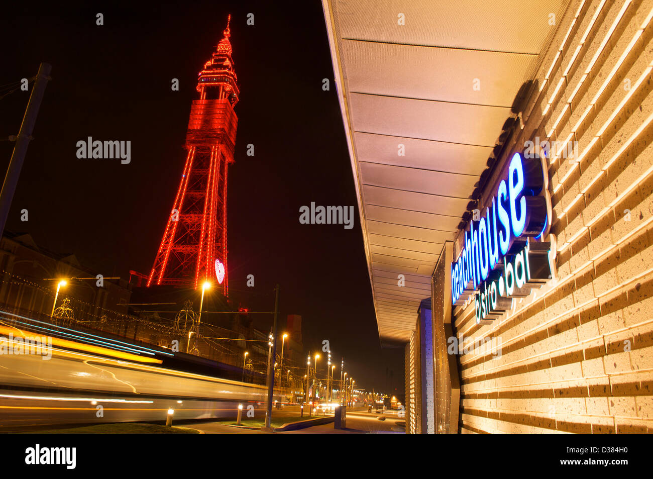 Blackpool,UK 12th Febuary 2013   The all new LED lighting on Blackpool tower is switched on for the first time after the legs have been in darkness for several years after major maintenance and refurbishment work was carried out.The iconic structure will shine bright red for the next few days to celebrate Valentine's day,Credit: kevin walsh / Alamy Live News Stock Photo