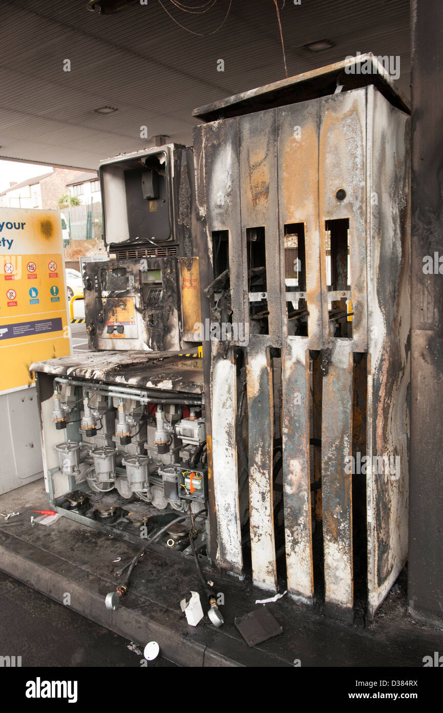 Burnt out Petrol Gas Station fuel pump fire Stock Photo