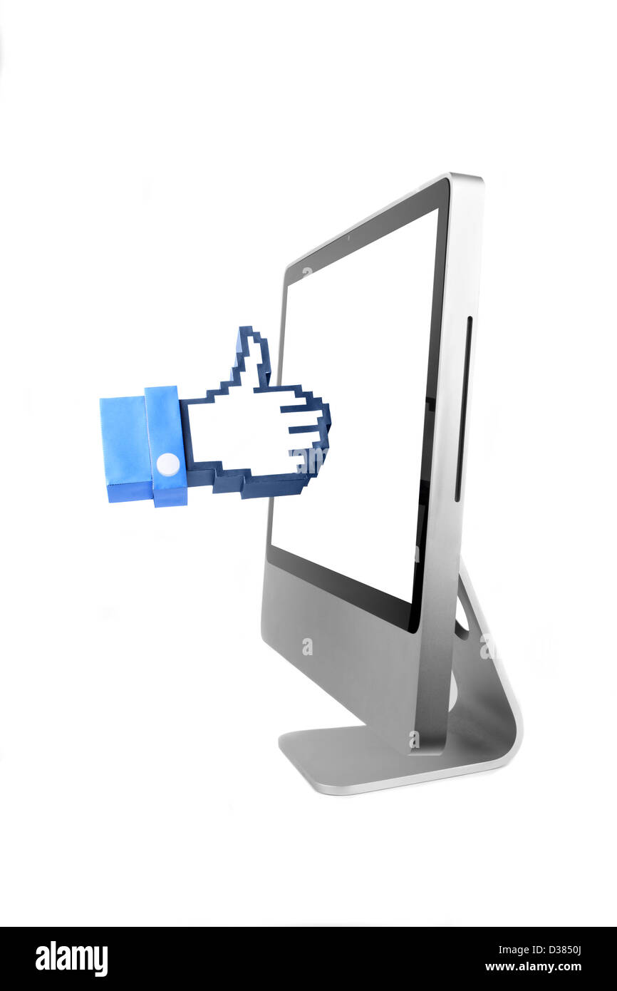 Computer with a hand cursor made in papercraft over white background ...