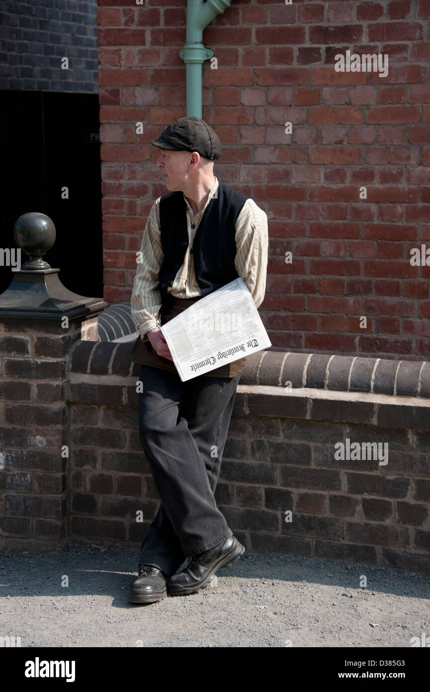 Victorian Newspaper seller boy traditional costume Stock Photo Alamy