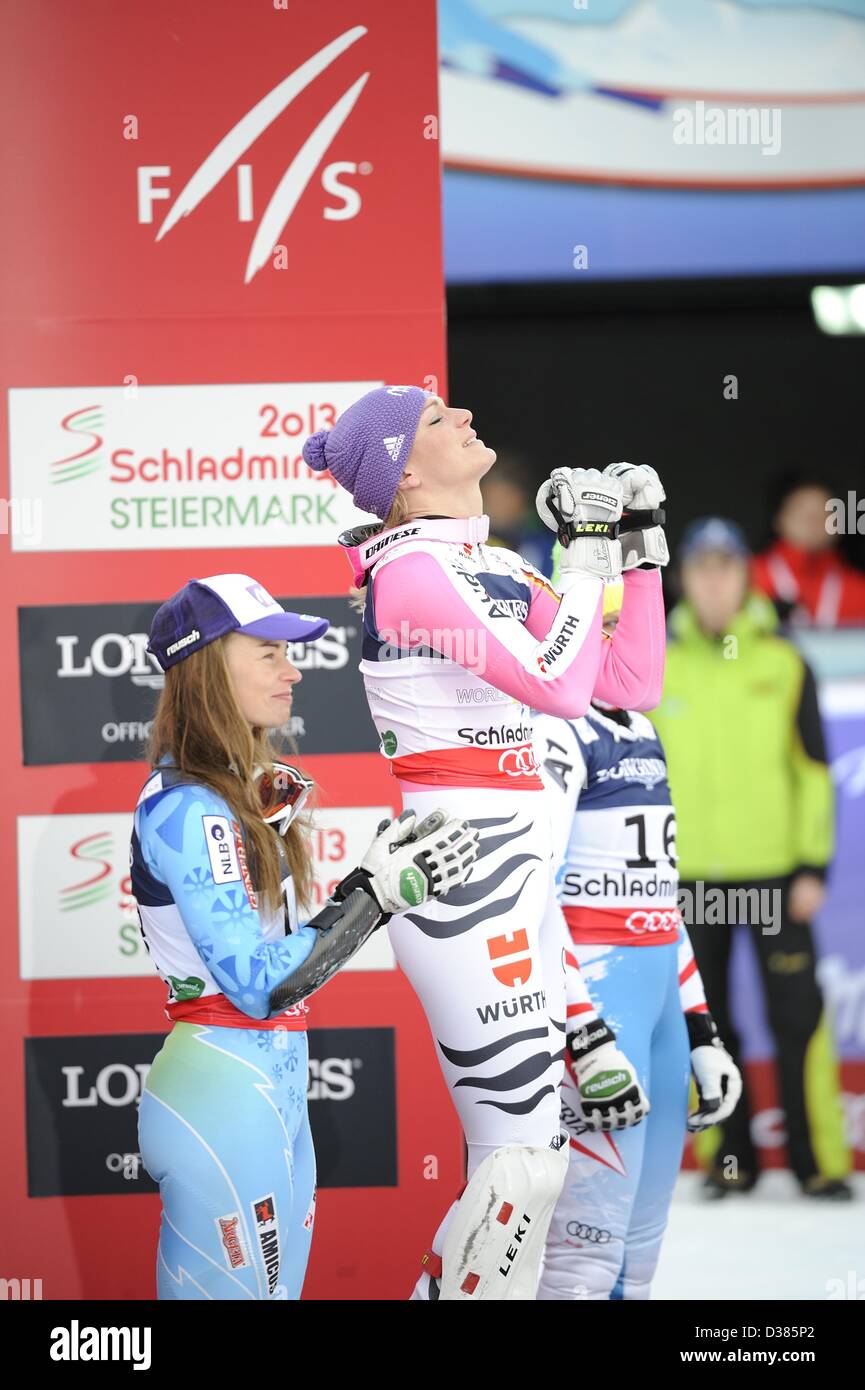 Schladming, Austria. 11th February 2013. (L-R) Tina Maze (SLO), Maria Hofl-Riesch (GER), FEBRUARY 8, 2013 - Alpine Skiing : Gold medalist Maria Hoefl-Riesch of Germany celebrates on the podium as silver medalist Tina Maze of Slovenia applauds during the flower ceremony after the Women's Super Combined on day four of the FIS Alpine World Ski Championships 2013 in Schladming, Austria. (Photo by Hiroyuki Sato/AFLO/Alamy Live News) Stock Photo