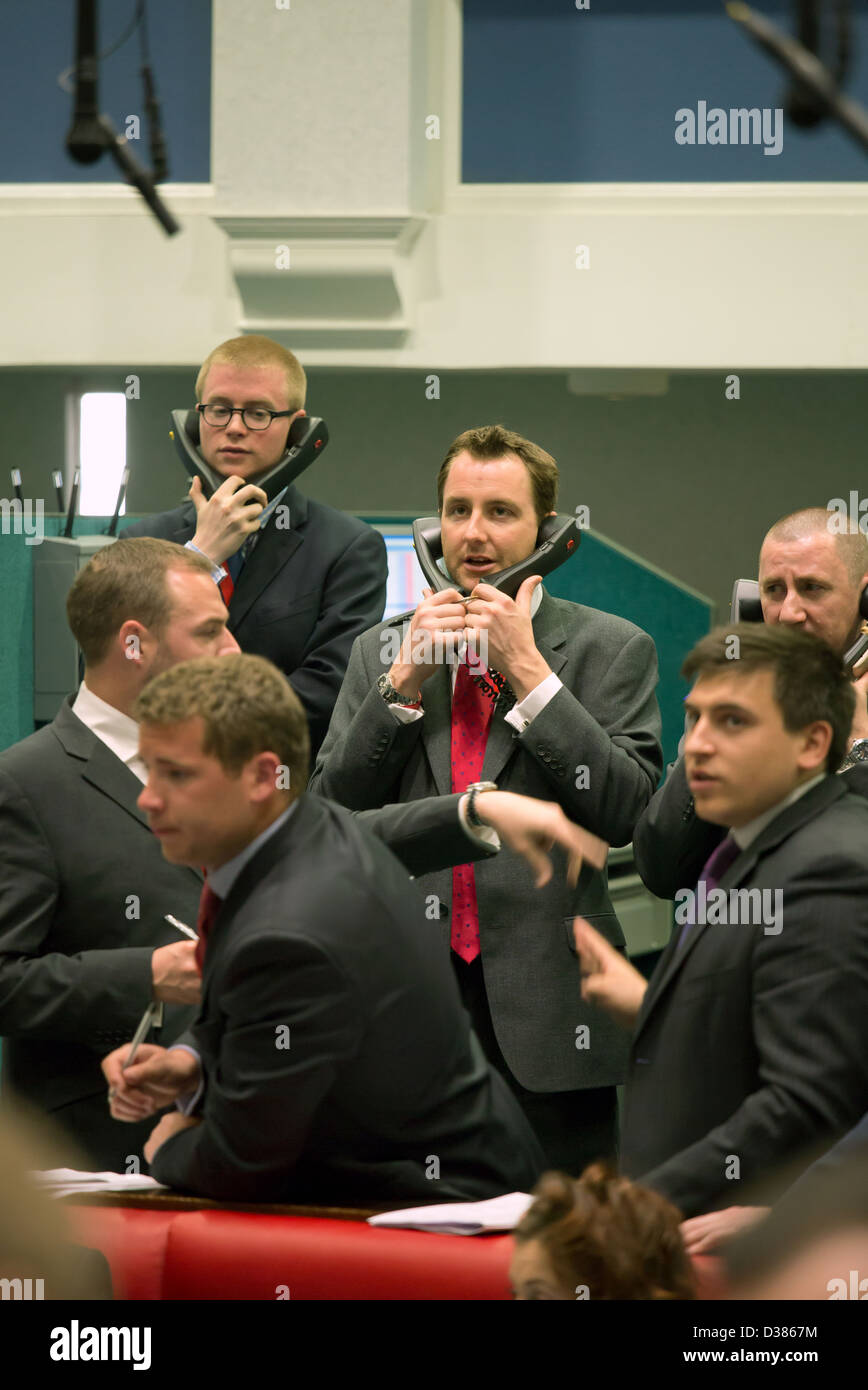 London, United Kingdom, brokers in the London Metal Exchange on phones Stock Photo