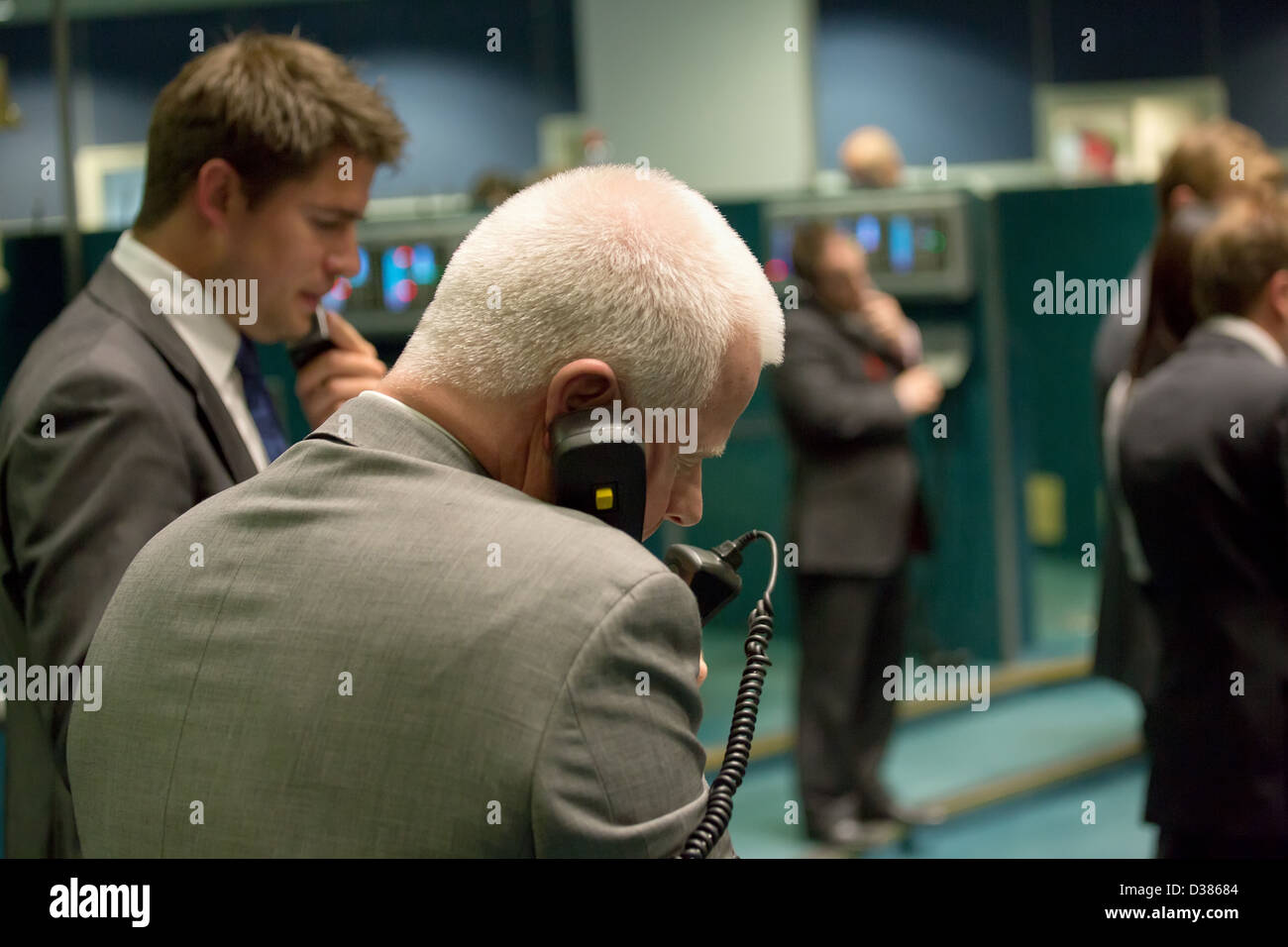 London, United Kingdom, brokers in the London Metal Exchange on phones Stock Photo