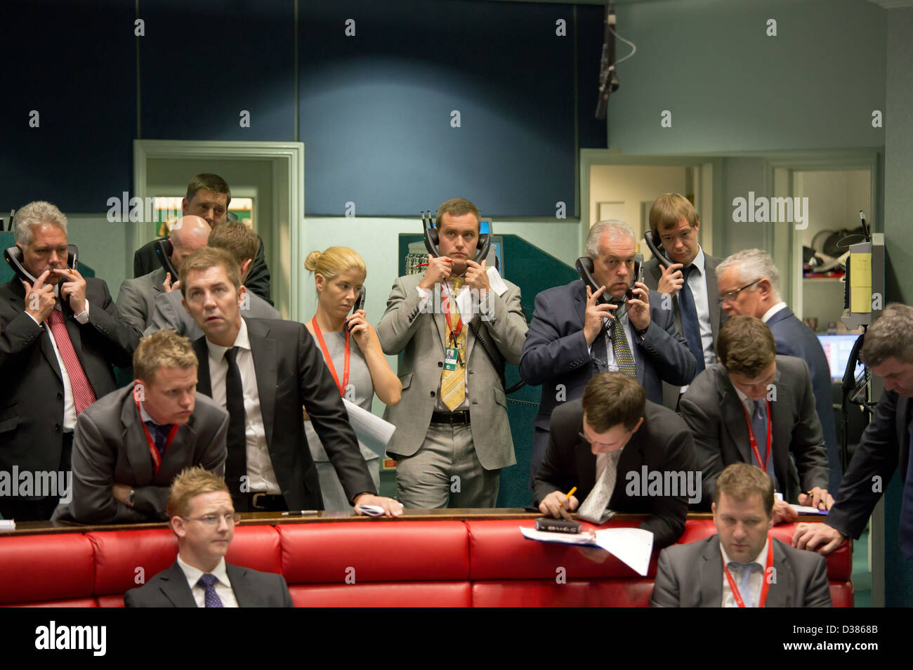 London, United Kingdom, brokers in the London Metal Exchange on phones Stock Photo