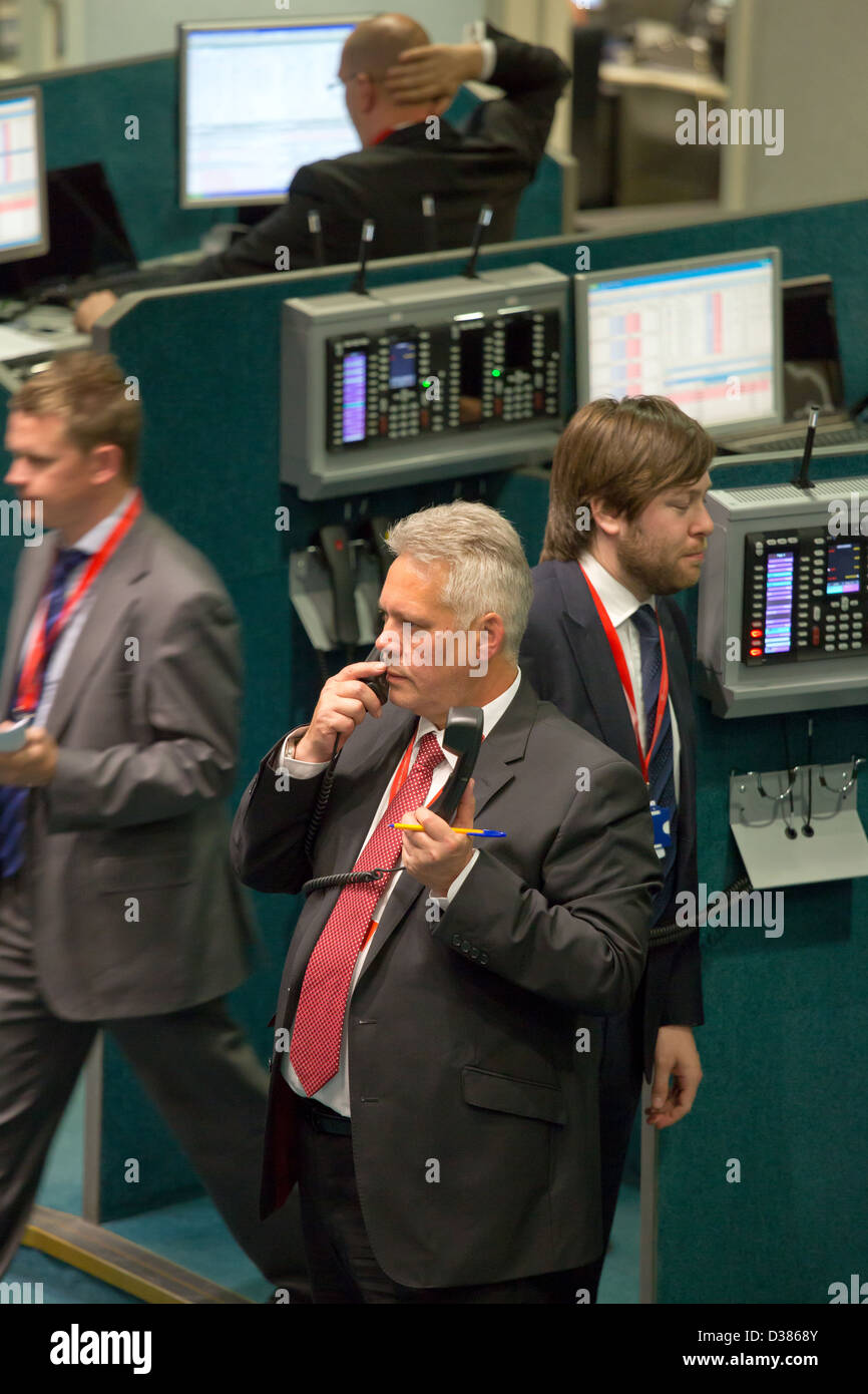 London, United Kingdom, brokers in the London Metal Exchange on phones Stock Photo