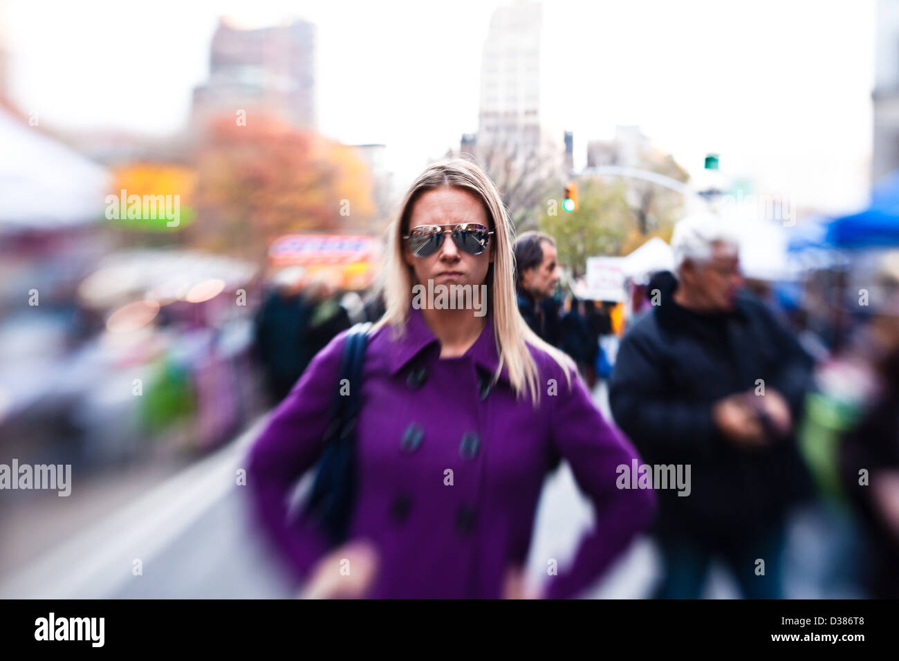 Young Woman looking anger on the street in New York City Stock Photo