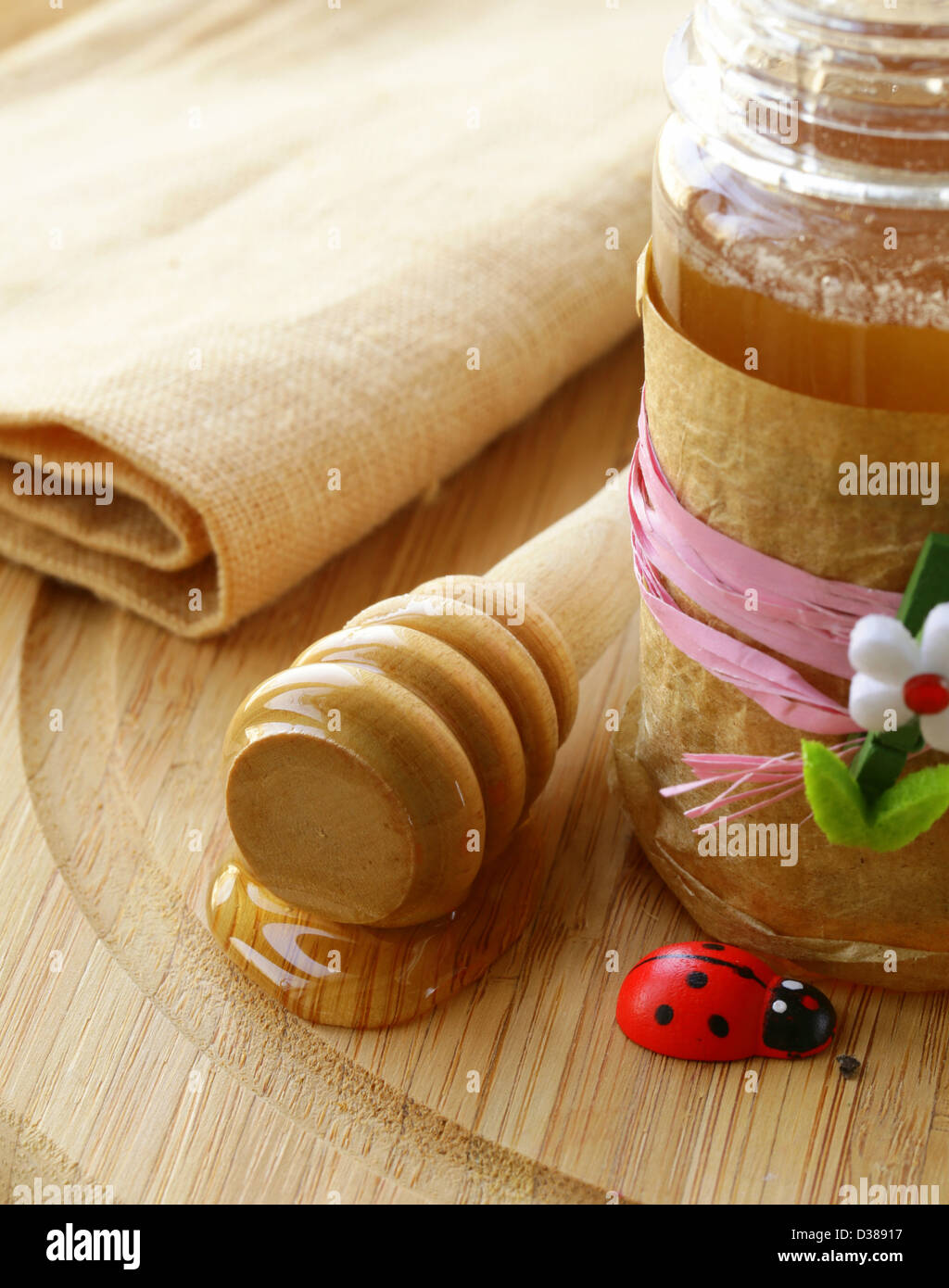 Natural organic flower honey in the pot Stock Photo