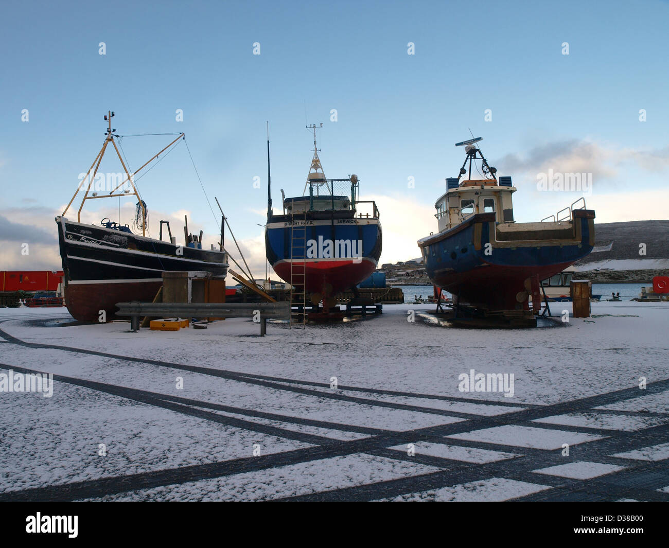 Small fishing boats on the quayside in Scalloway, Shetland, Scotland Stock Photo