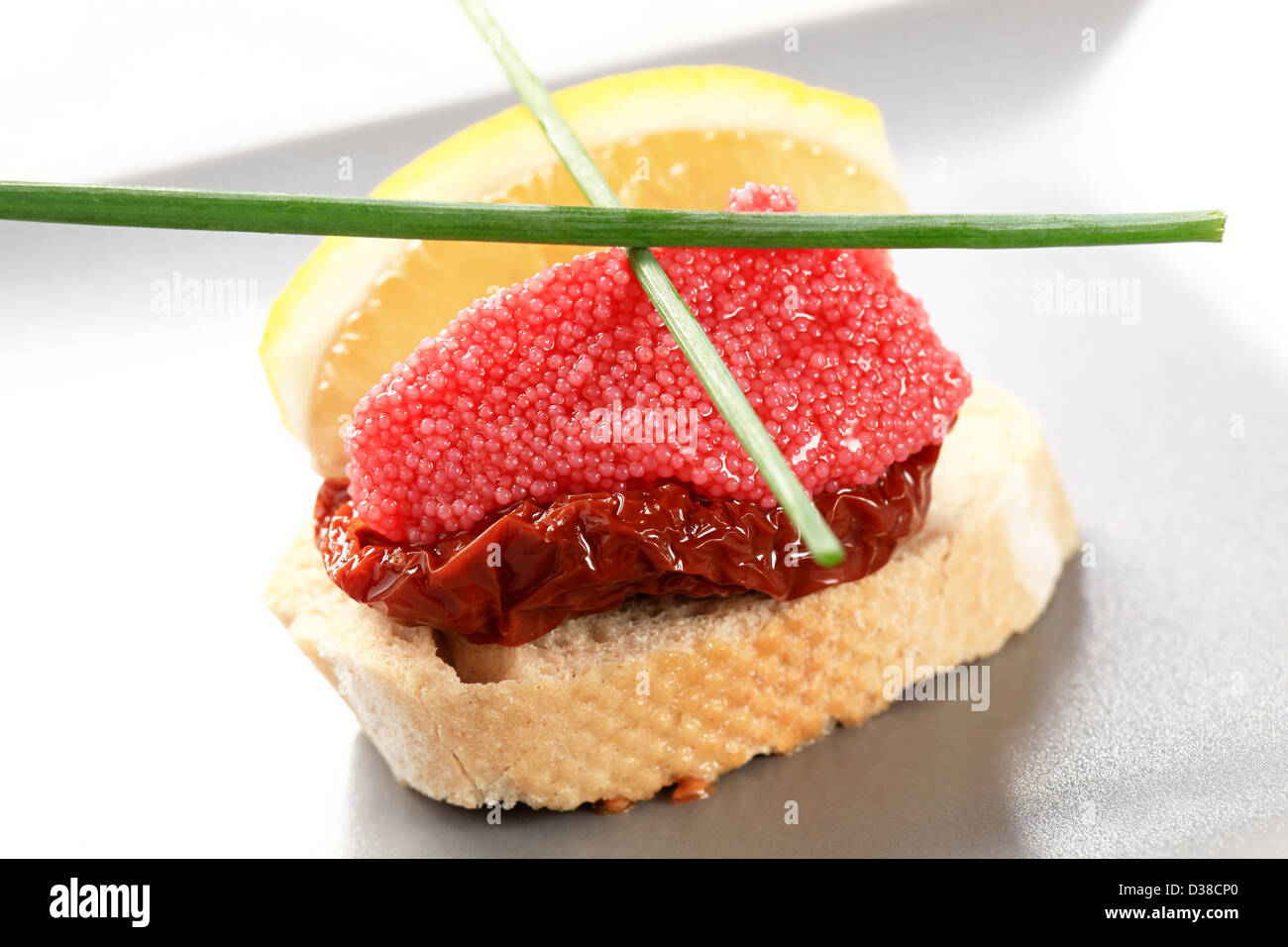 Bite-sized hors d'oeuvre - Red caviar canape Stock Photo