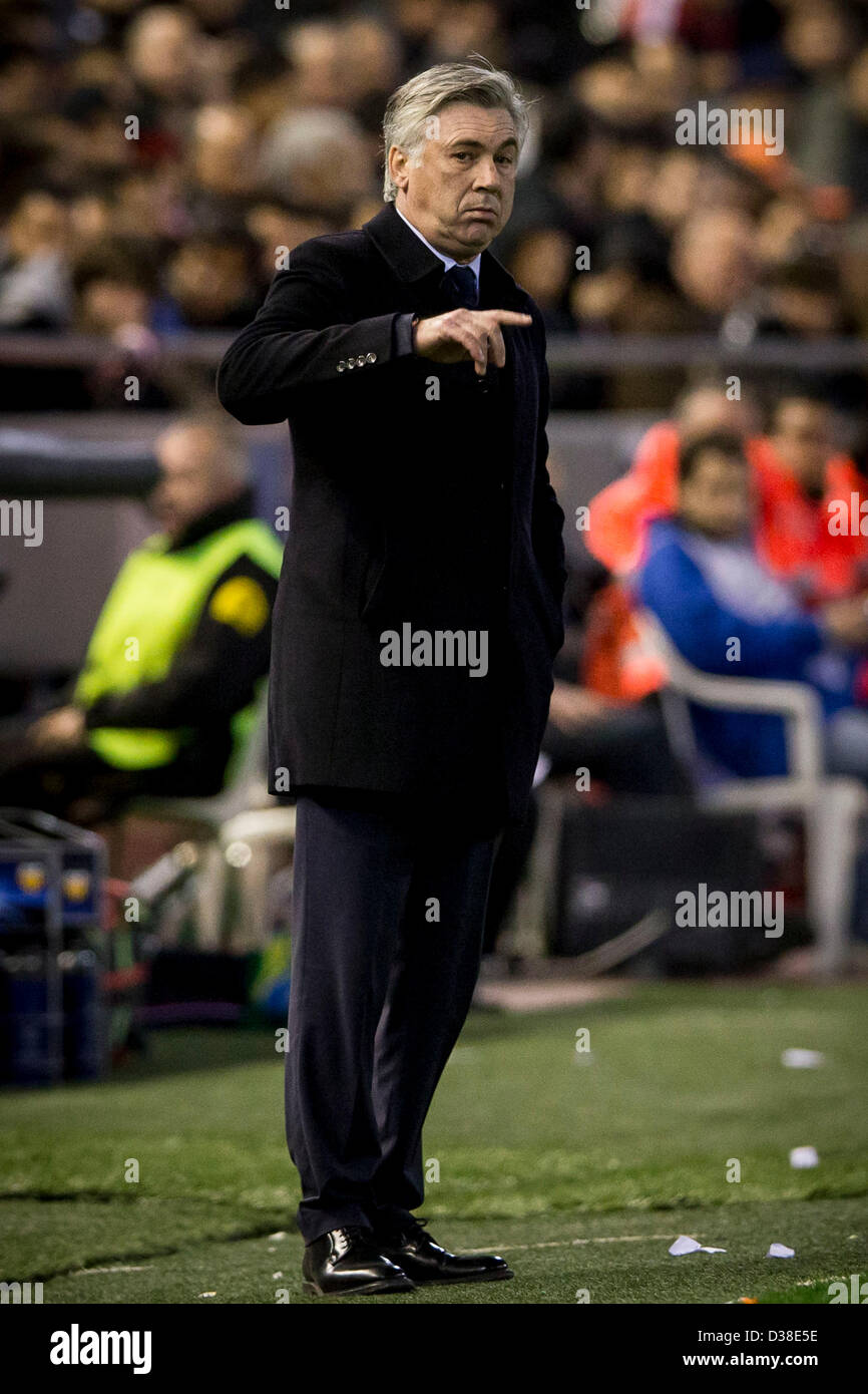 Valencia, Spain. 12th February 2013. Head Coach Carlo Ancelotti of PSG  gives instructions to his team during the Champions League game between  Valencia and Paris Saint Germain from the Mestalla Stadium Stock