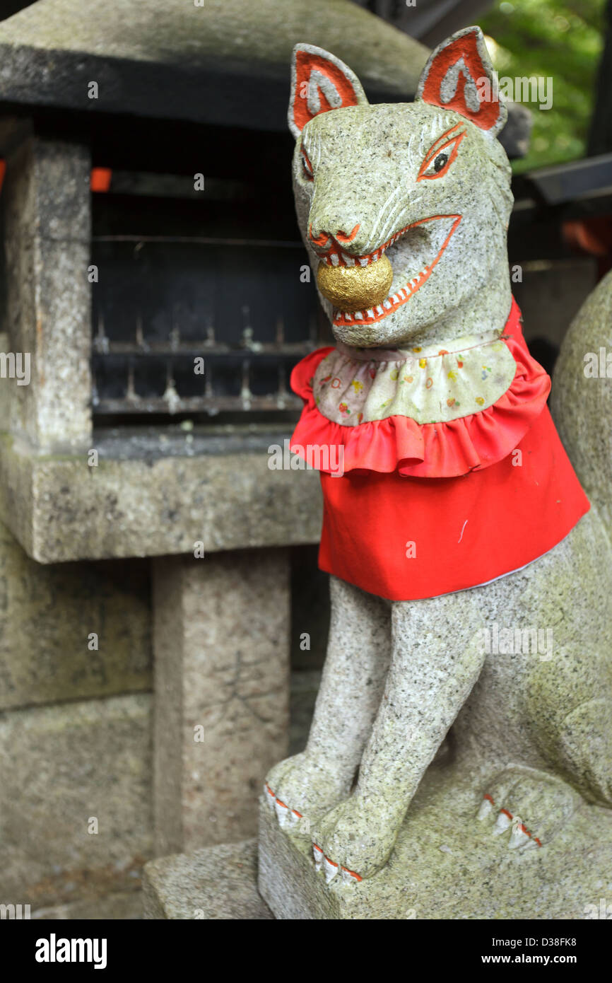 God fox statue in fushimi inari shrine near Kyoto, Japan Stock Photo