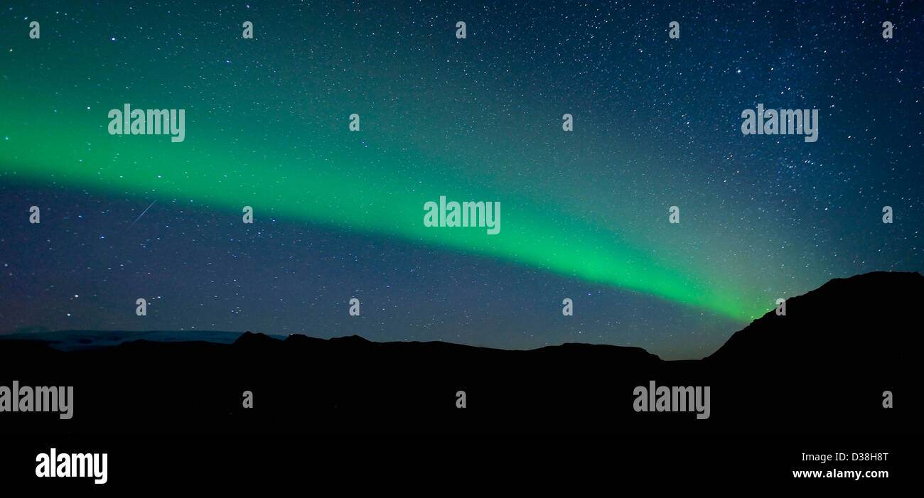 Northern lights in night sky Stock Photo