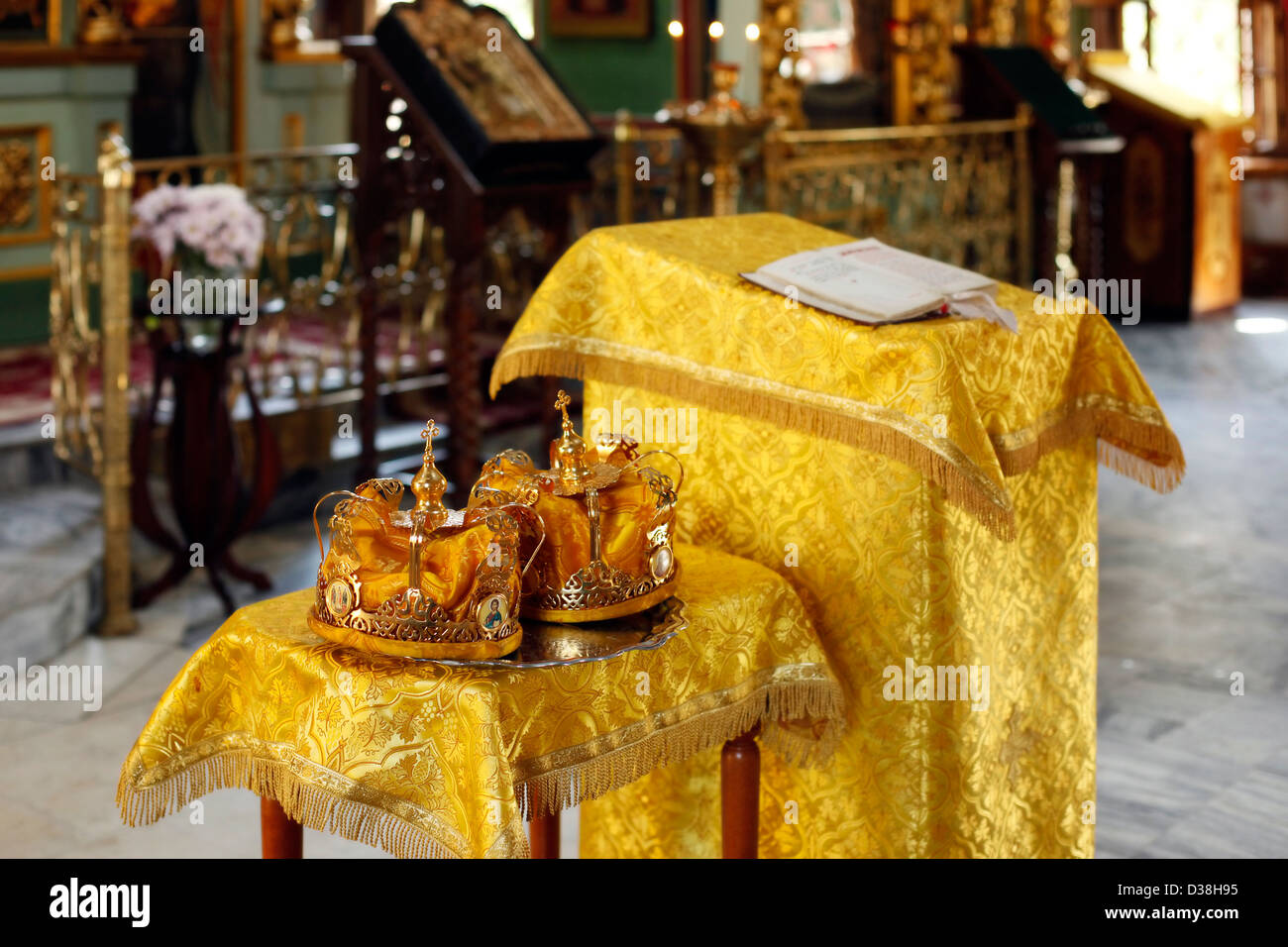 Two wedding crowns in the church Stock Photo - Alamy
