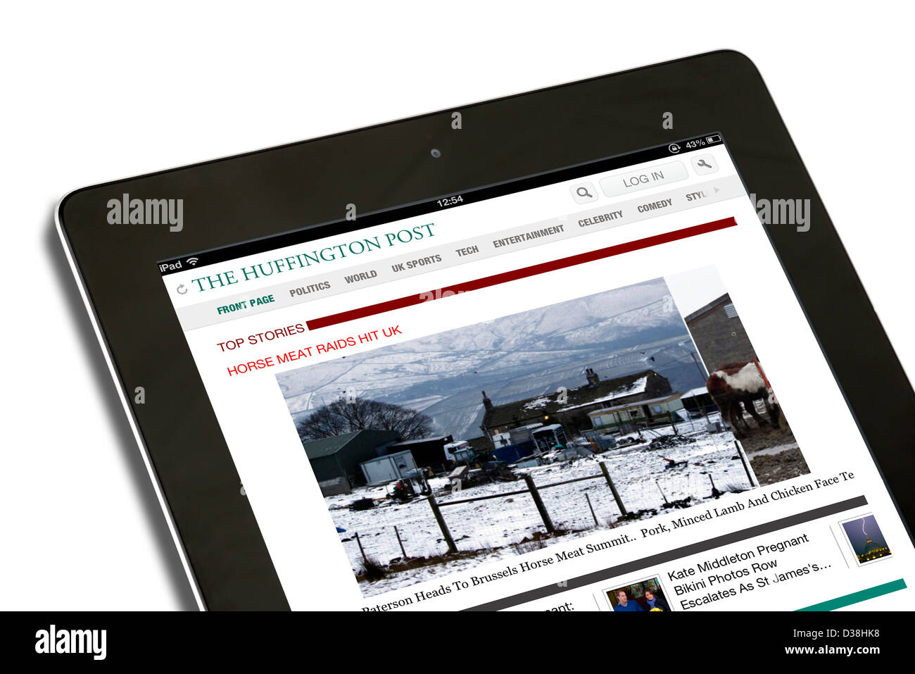 iPad App showing the UK edition of the Huffington Post viewed on a 4th generation Apple iPad, UK Stock Photo