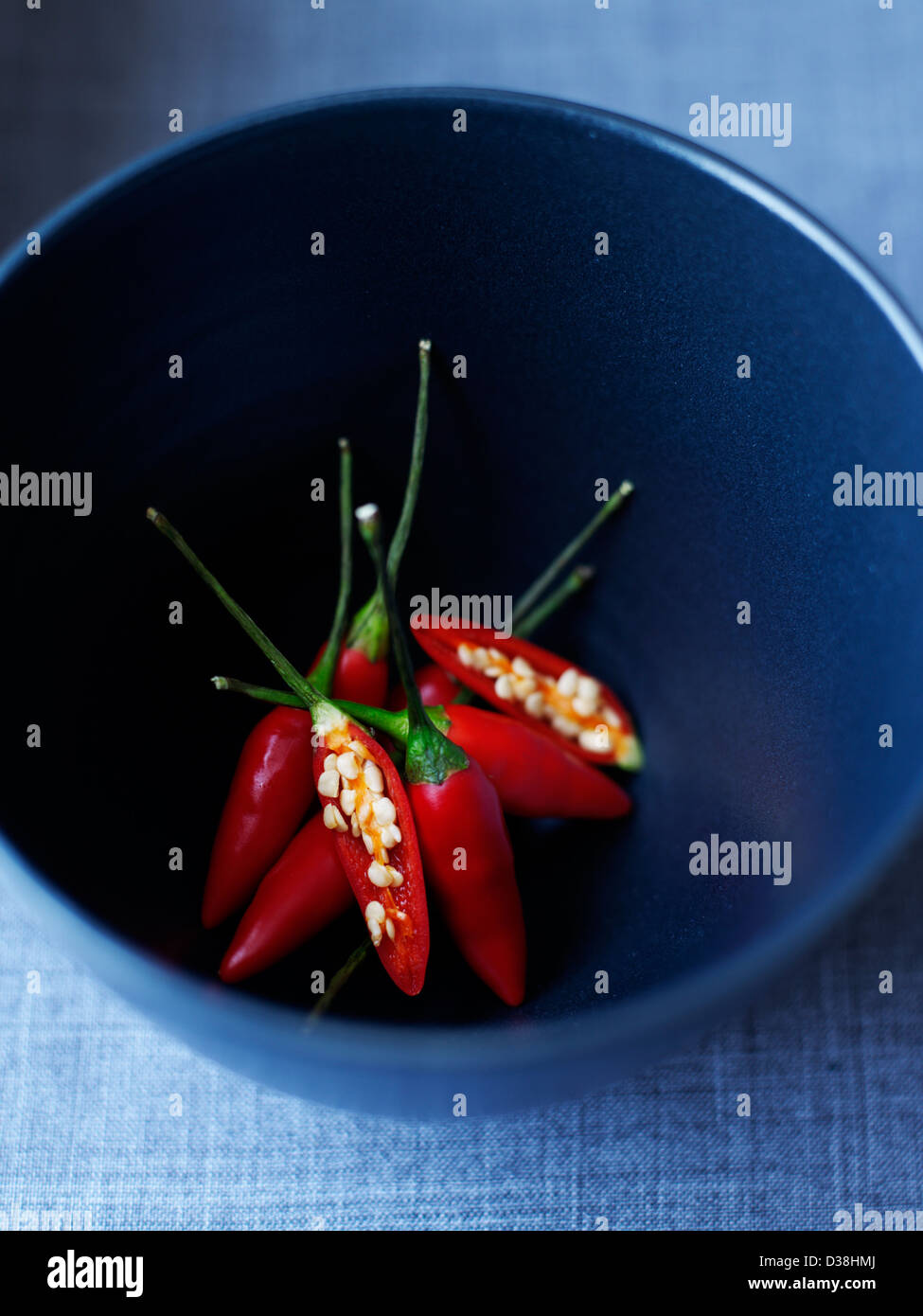 Bowl of sliced chili peppers Stock Photo