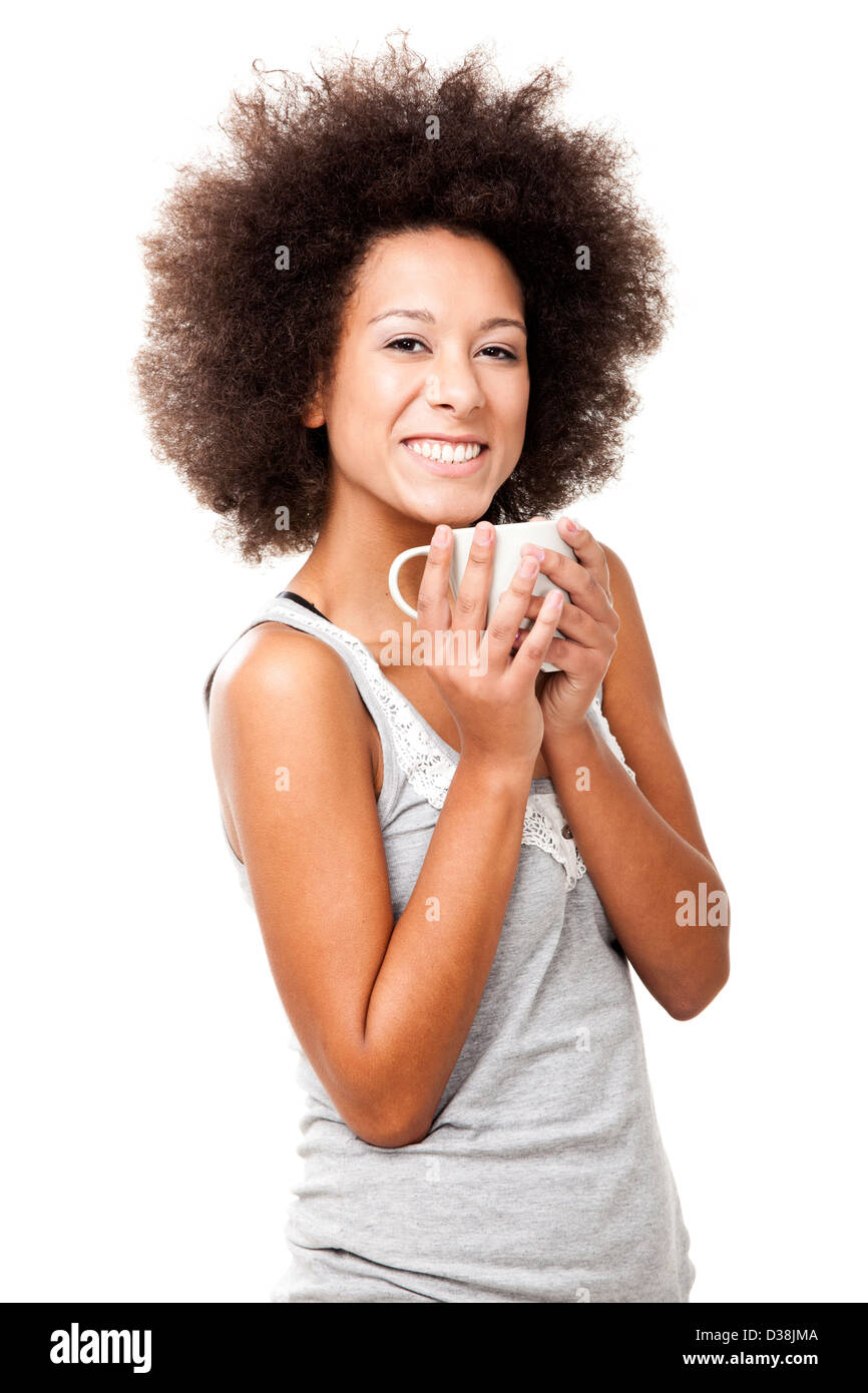 Beautiful young woman holding a cup of coffee, isolated on white Stock ...