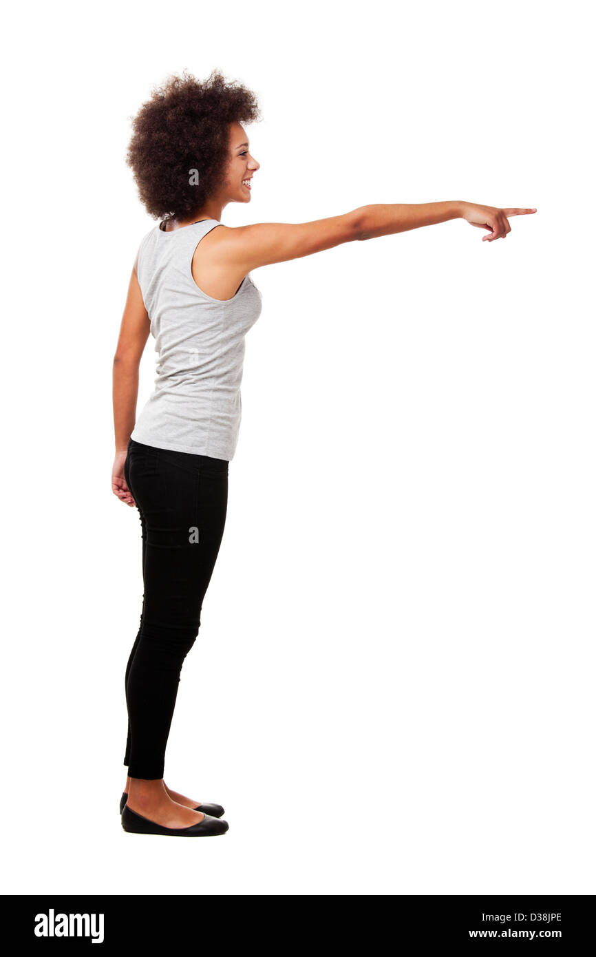 Beautiful African American woman pointing to something, isolated on ...