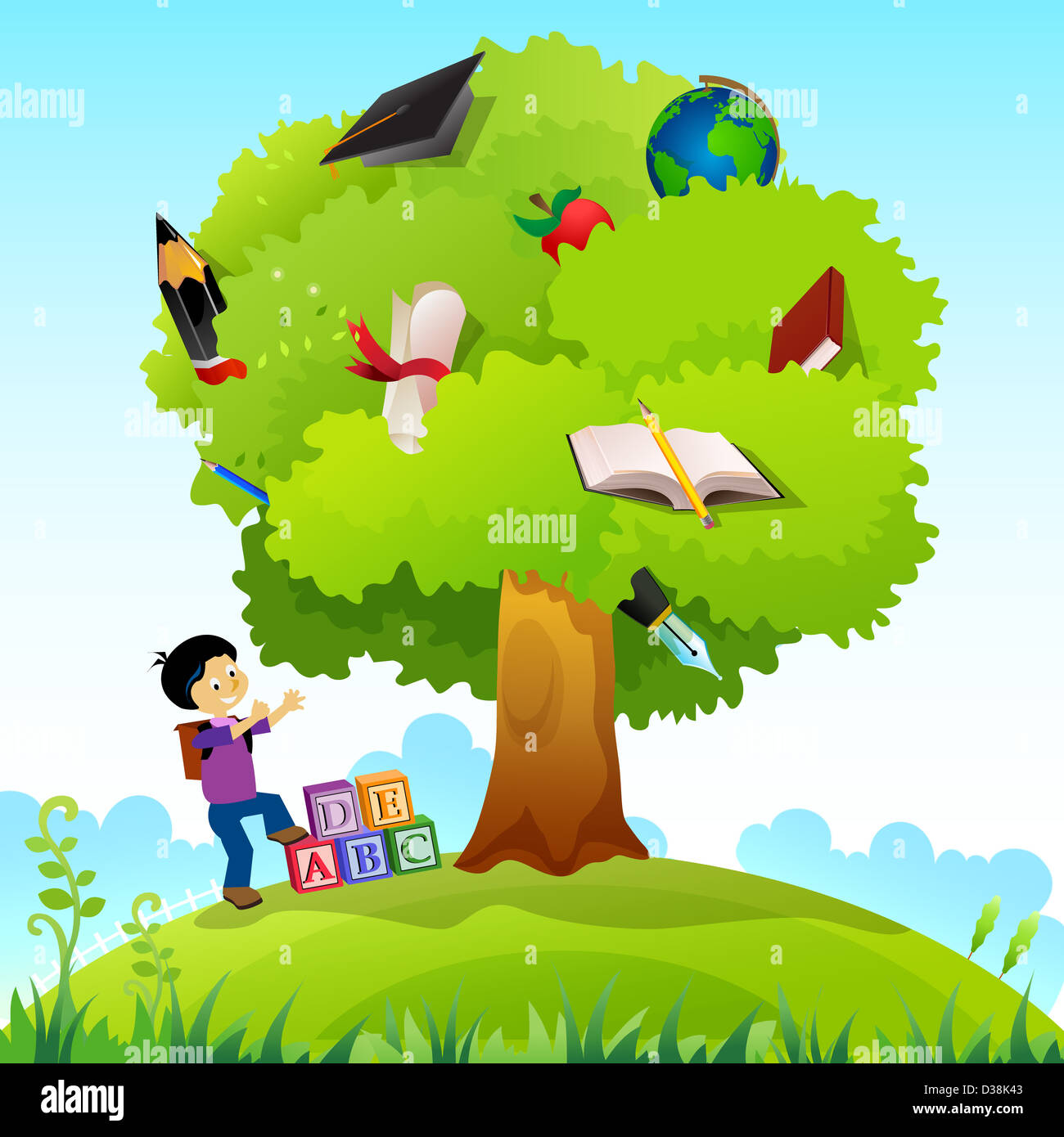Schoolboy standing near a knowledge tree Stock Photo
