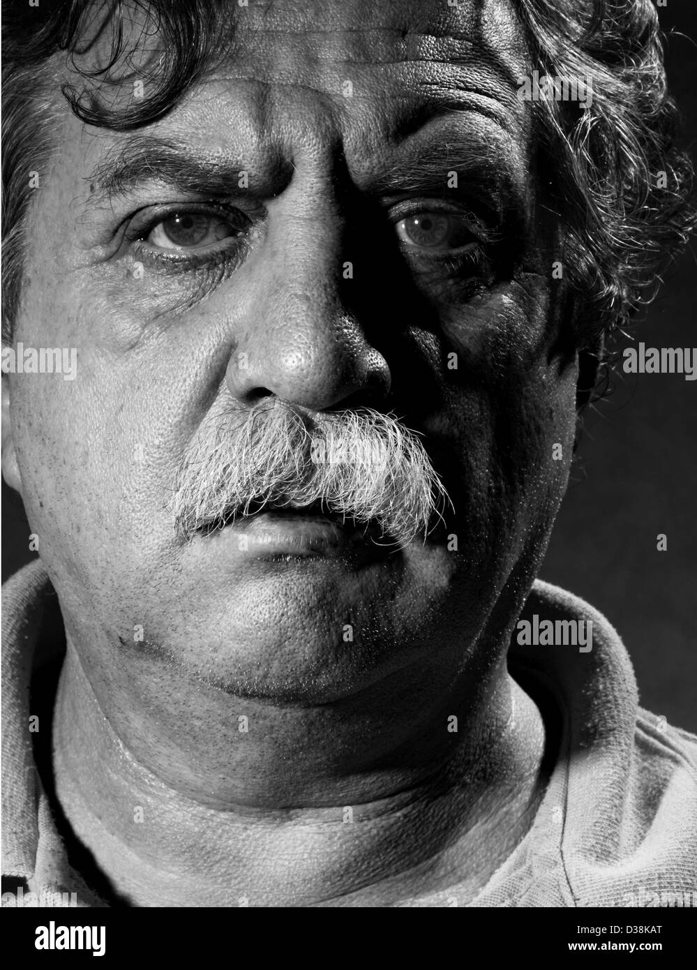 Studio portrait of middle aged man, black and white Stock Photo - Alamy
