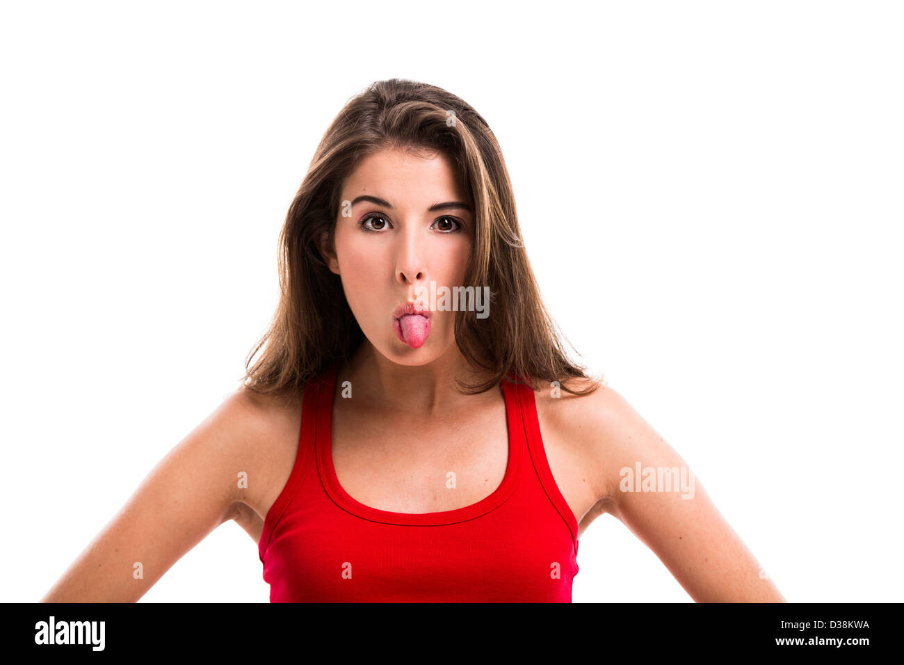 Beautiful young woman throwing tongue out, isolated over white background Stock Photo Alamy