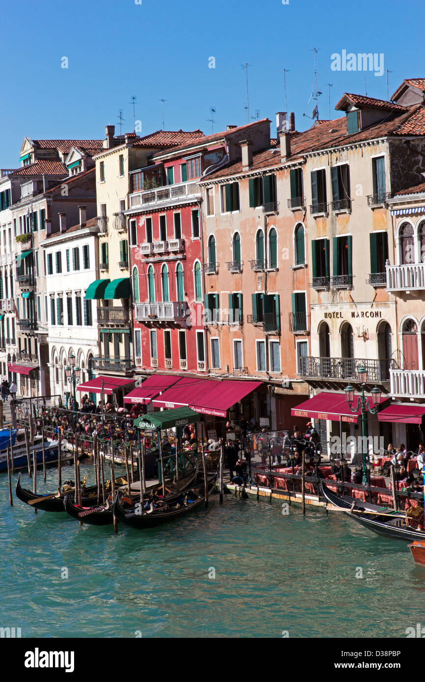 View from Rialto bridge in the Grand canal and gondolas of Venice ...