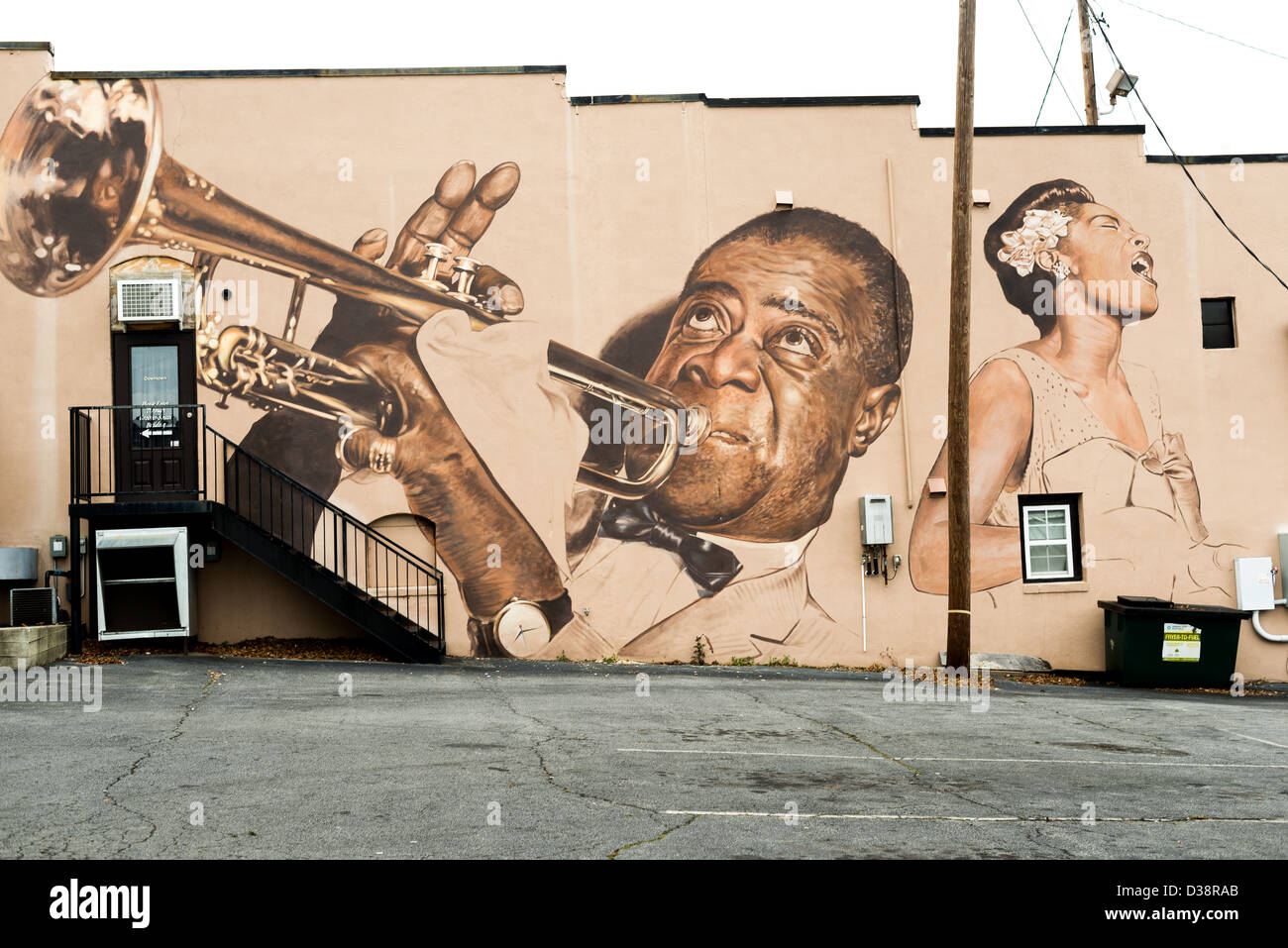 Two American musical and jazz icons, Billie Holiday and Louis Armstrong