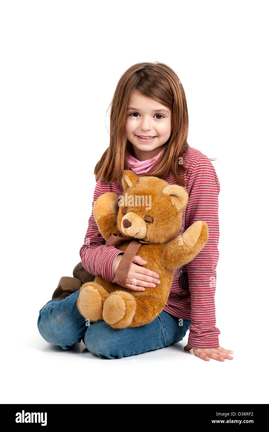 Beautiful young girl with teddy bear Stock Photo - Alamy