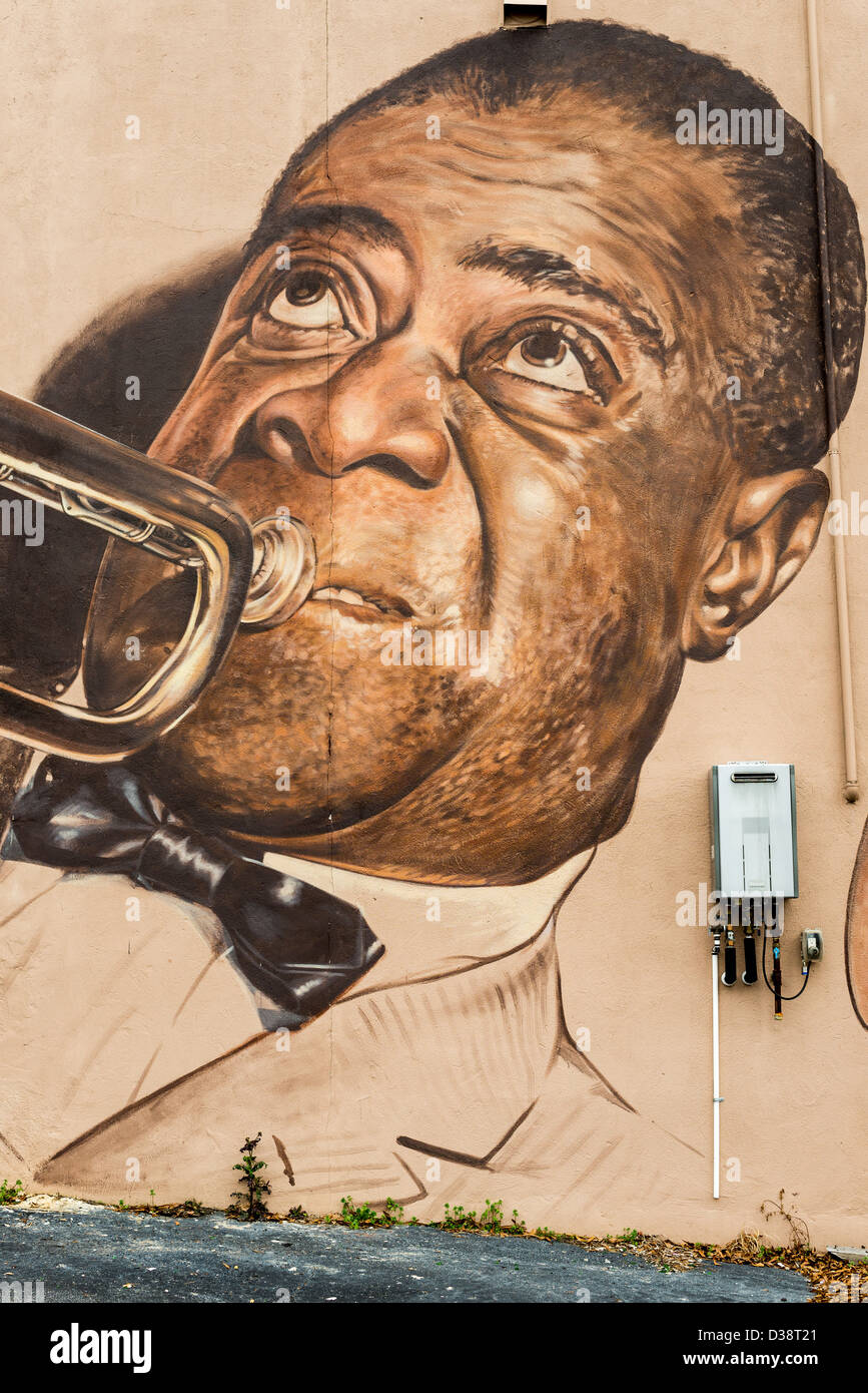 The legendary jazz and musical icon Louis Armstrong plays trumpet on