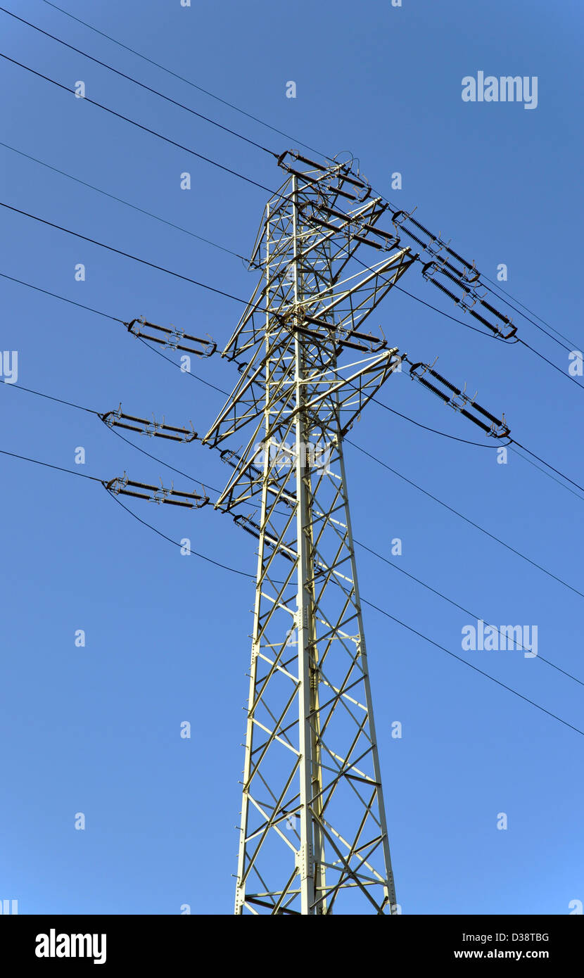 High voltage electric power line pylon on blue sky Stock Photo - Alamy