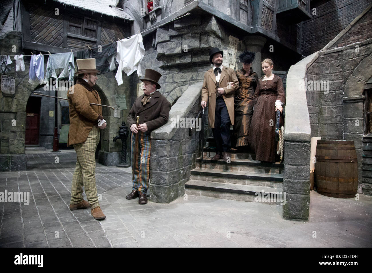 Actors portraying Victorian Dickensian characters at Dickens World in UK Stock Photo