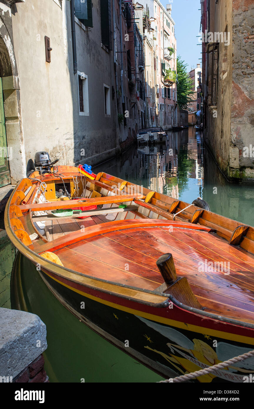 Boat Moored in Front of Old Buildings in Venice Stock Photo - Alamy