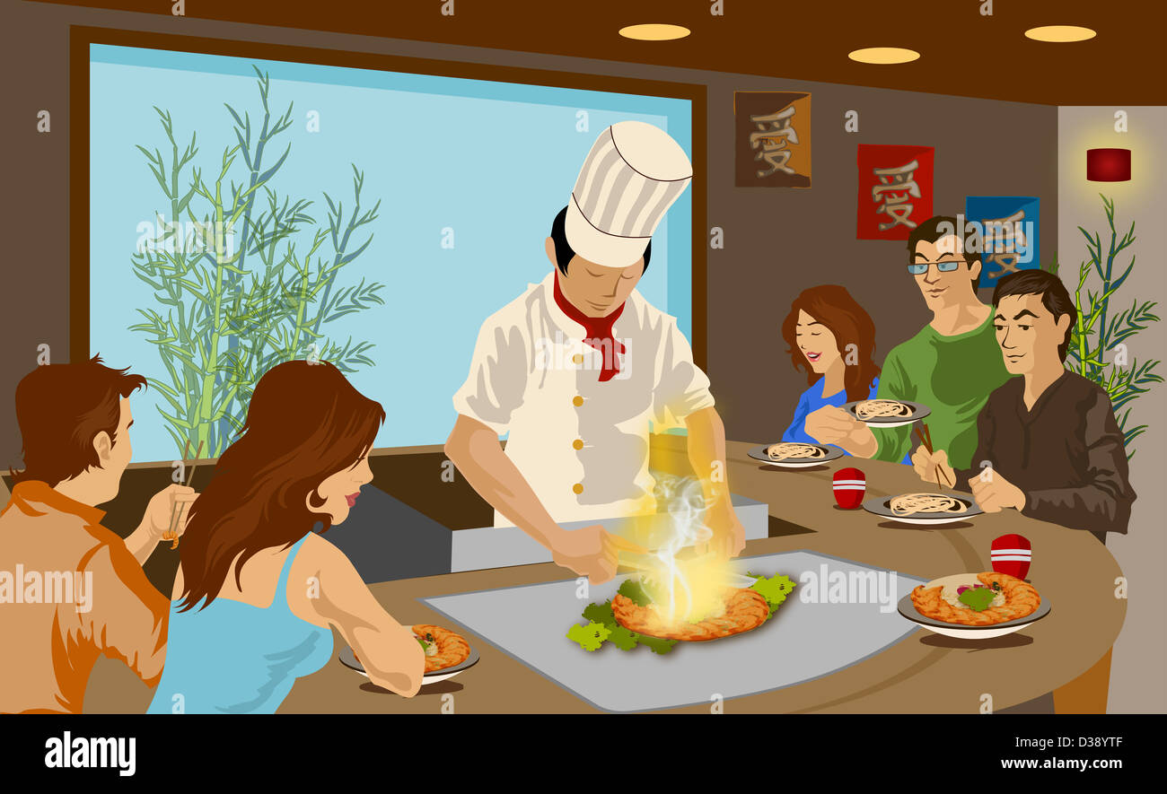 Chef cooking Japanese cuisine in a restaurant Stock Photo