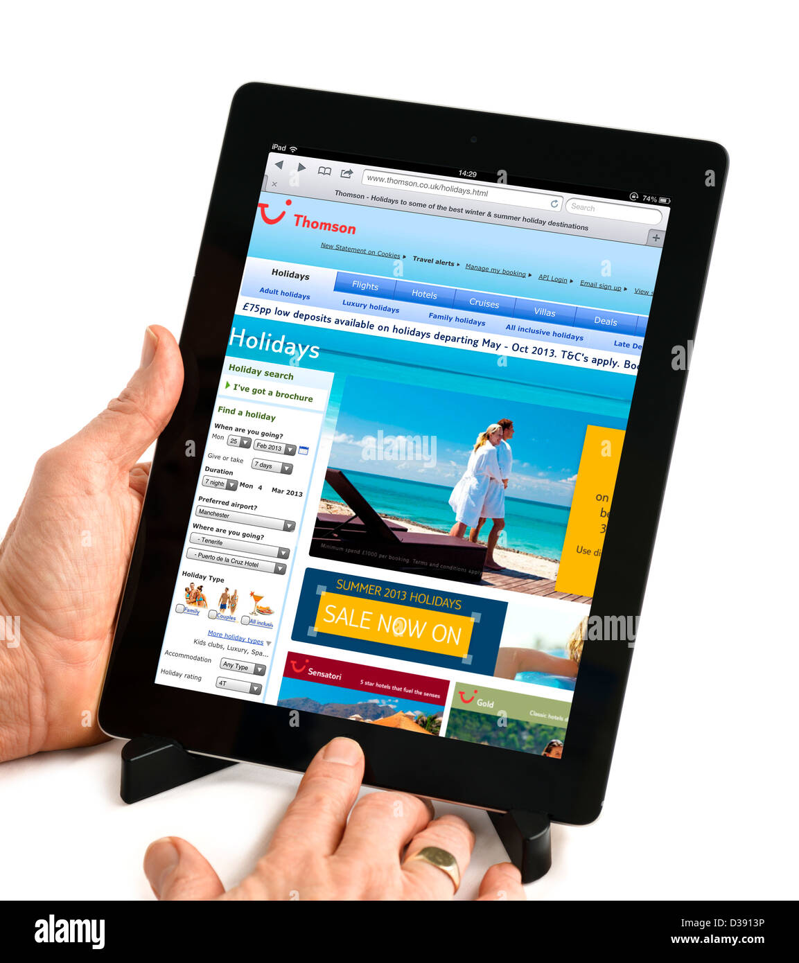 The Thomson Holidays website viewed on a 4th generation Apple iPad tablet computer, UK Stock Photo