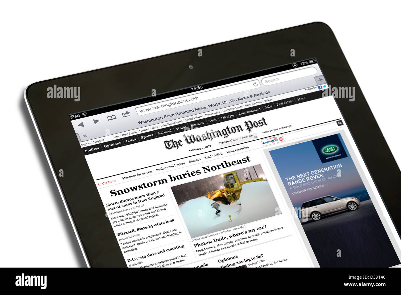 Reading the online edition of the Washington Post viewed on a 4th generation Apple USA Stock Photo Alamy