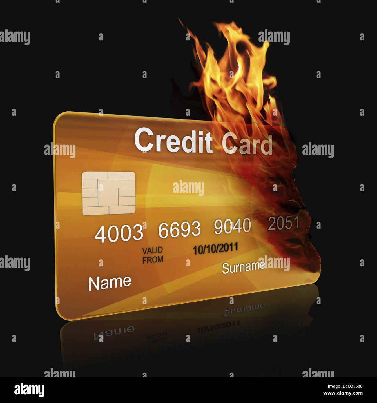 A gold credit card burning over black background Stock Photo