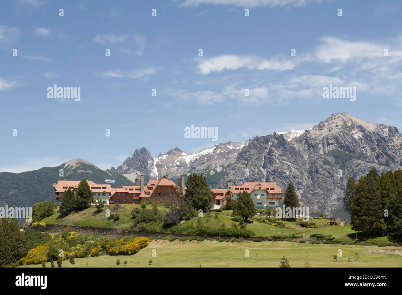 Bariloche's Llao Llao hotel sits amid a setting of vast snow topped mountains Stock Photo