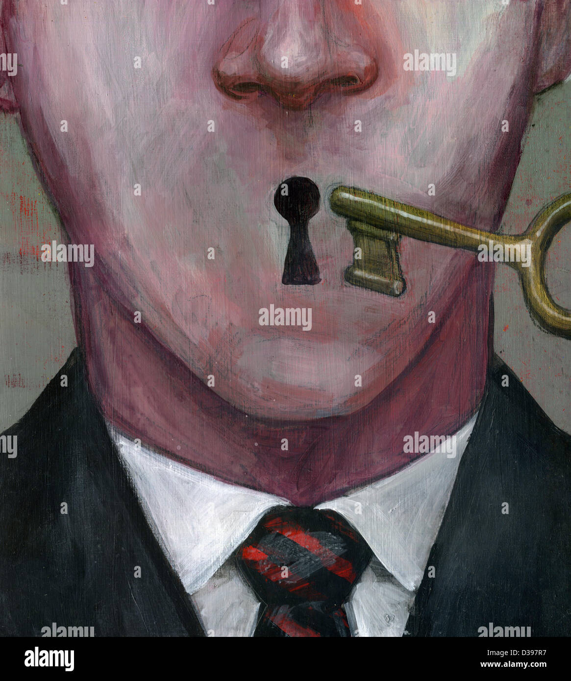 Close-up of a male executive with key depicting business secrecy Stock Photo