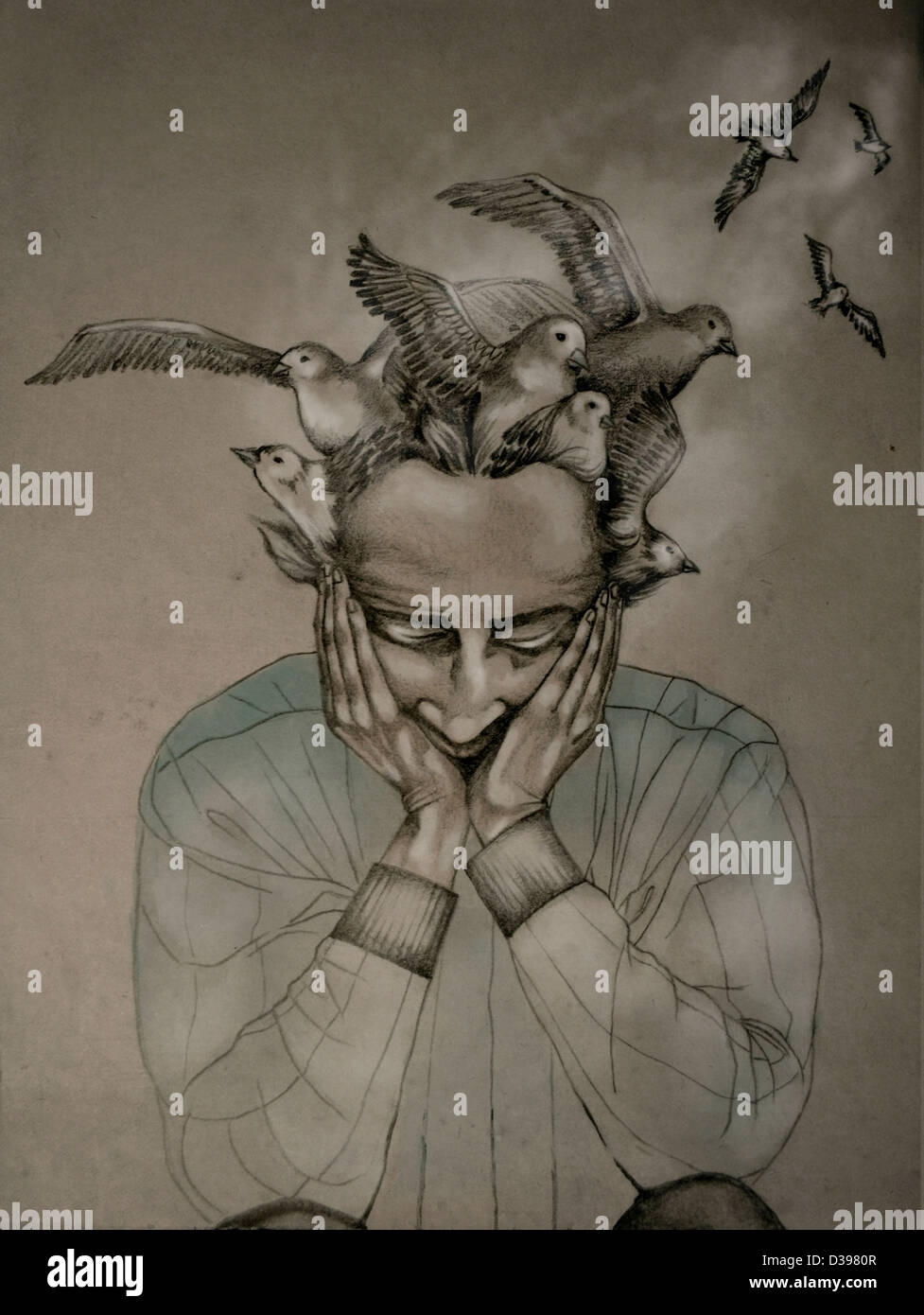 Birds flying from head of a man depicting Alzheimer's disease Stock Photo