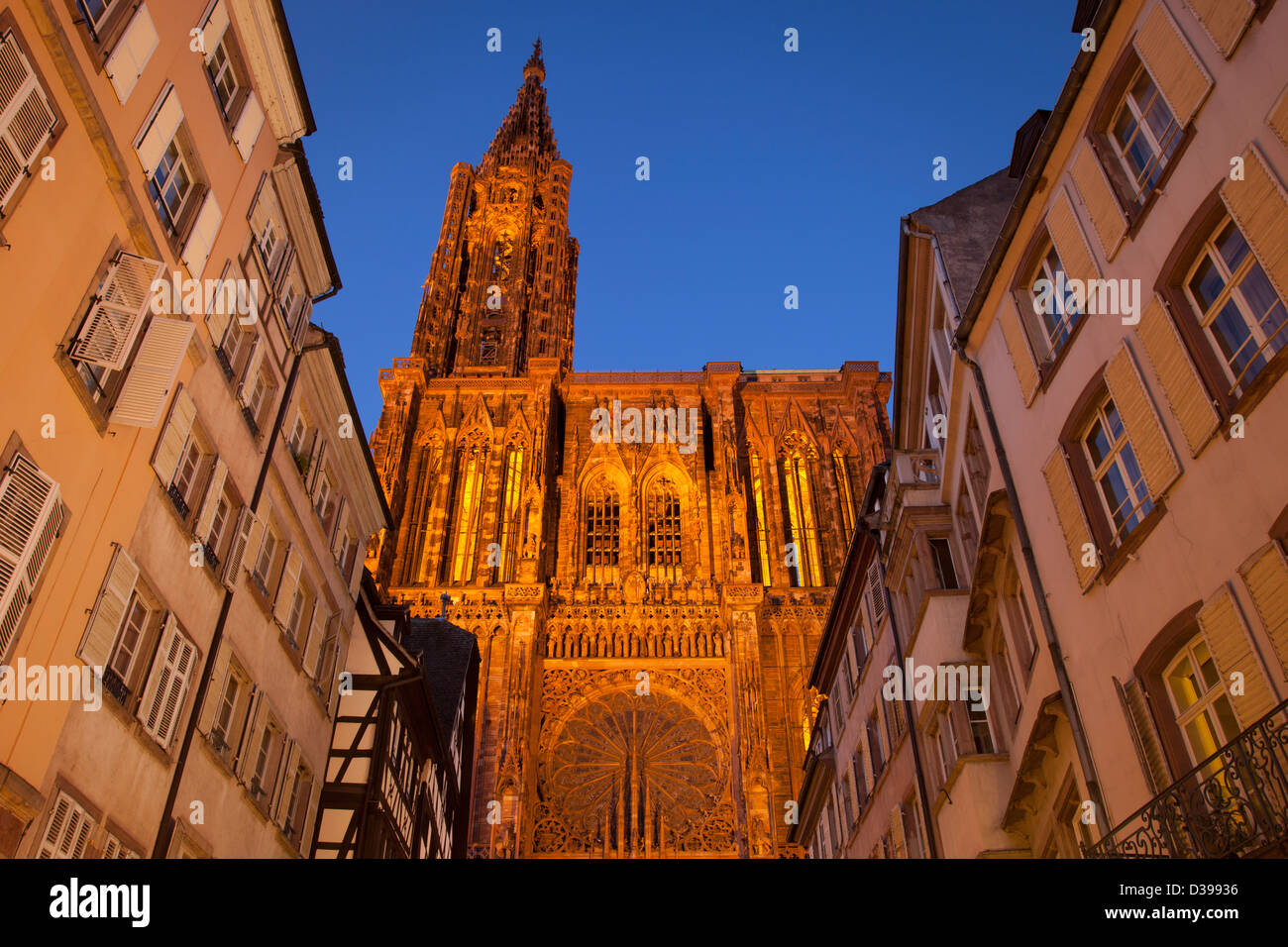 Ornate Strasbourg Cathedral towers over the buildings in Strasbourg, Alsace France Stock Photo