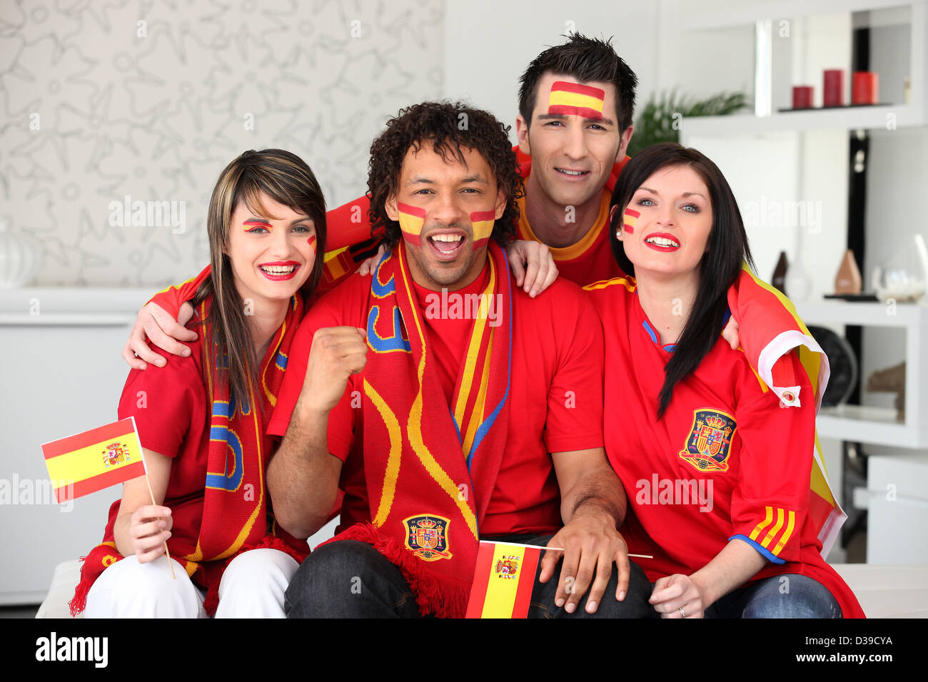 Four Spanish sports fans Stock Photo Alamy